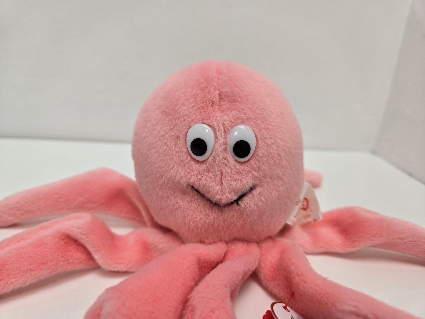 Ty Beanie Baby “Inky” the adorable pink smiling octopus (6.5 inch)