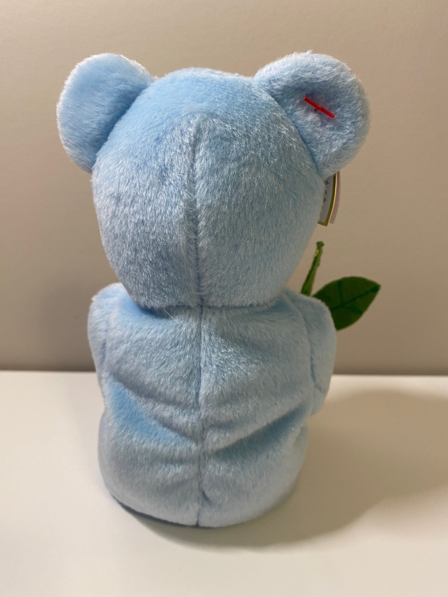 Ty Beanie Baby “Bluebonnet” the Blue Bear Holding Flowers (8.5 inch)