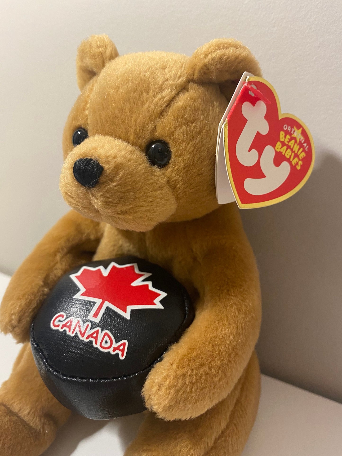 Ty Beanie Baby “Deke” the Hockey Bear Holding a Puck! (7 inch)