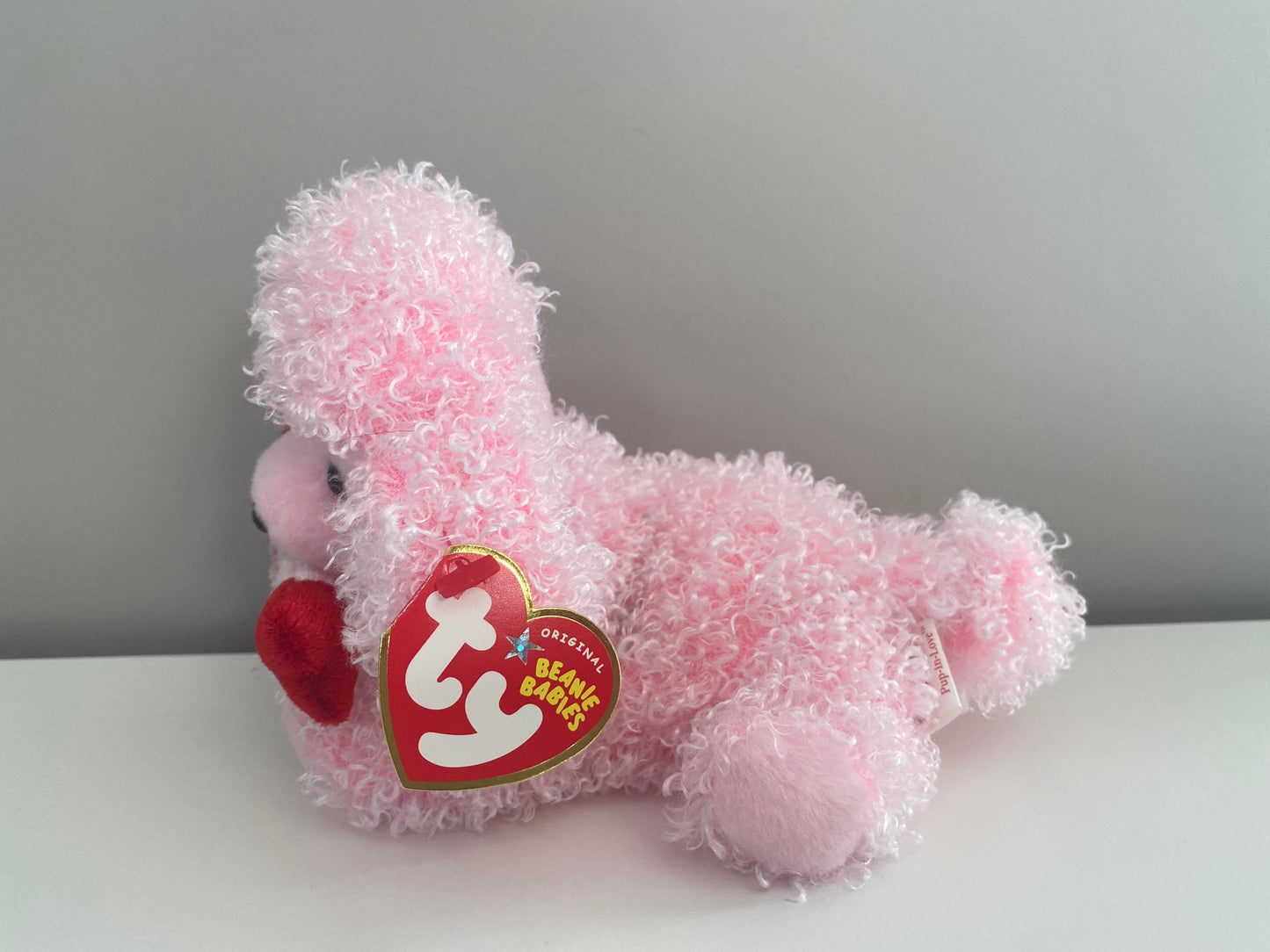 Ty Beanie Baby “Pup-in-Love” the Pink Poodle holding an I Love You Bone (5.5 inch)