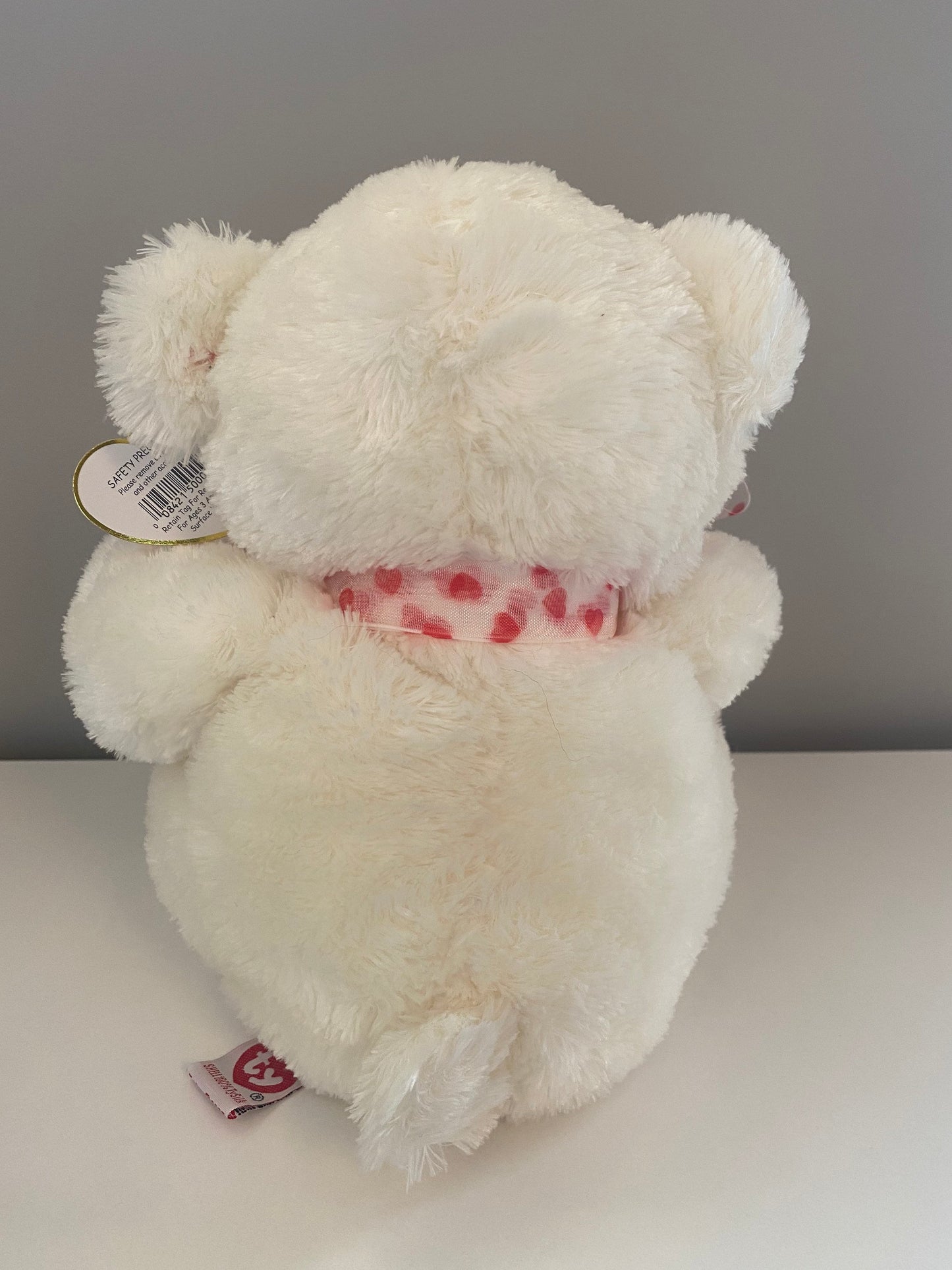 Ty Classics Collection “Caressa” the Bear  with Hearts on Feet and  Ribbon Bow around Neck (11 inch)