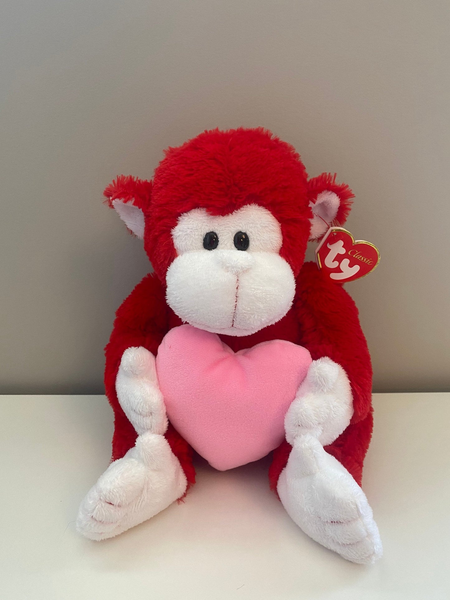 Ty Classics Collection “Dynamite” the Red Monkey Holding a Pink Heart (12 inch)