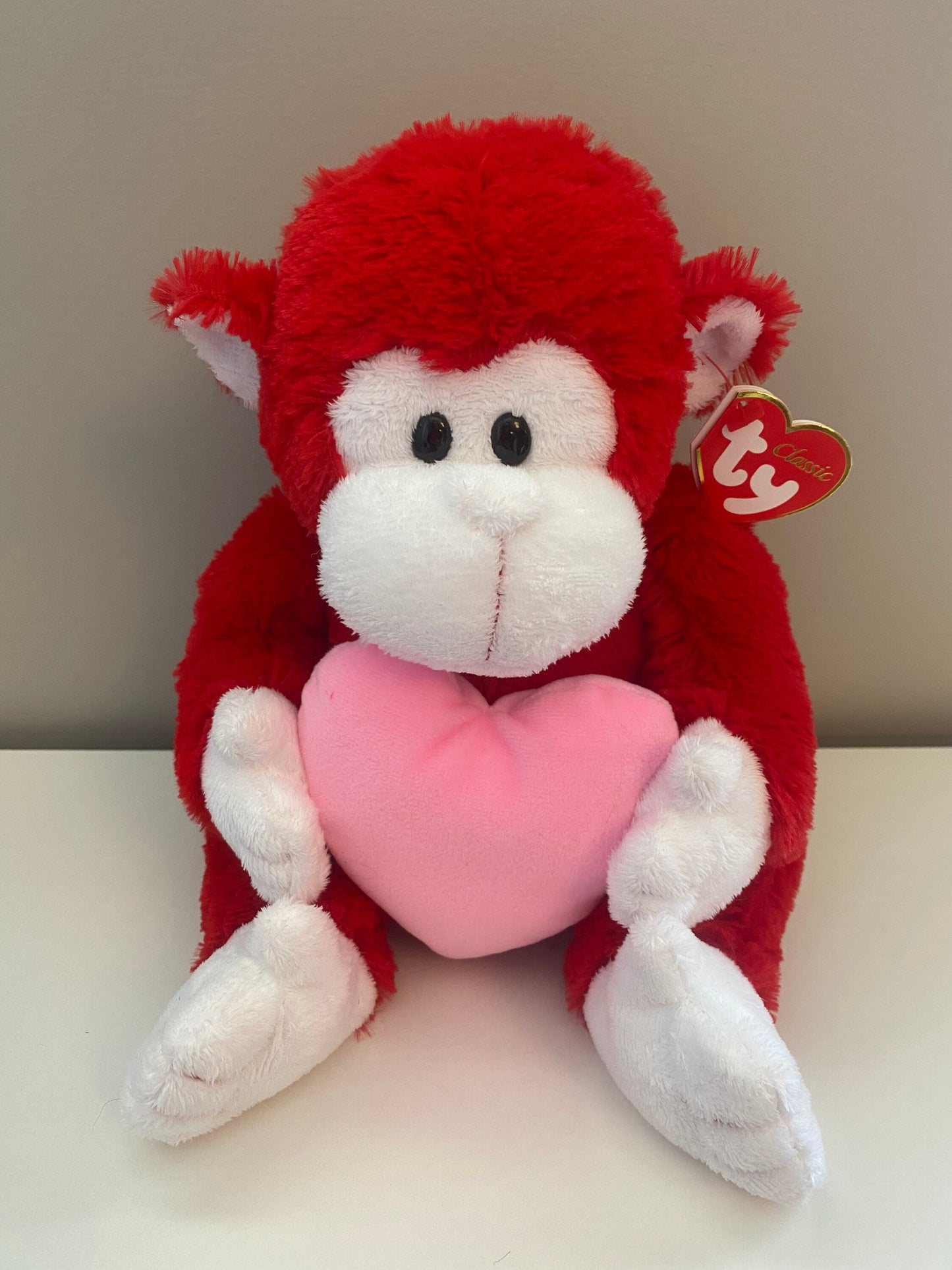 Ty Classics Collection “Dynamite” the Red Monkey Holding a Pink Heart (12 inch)