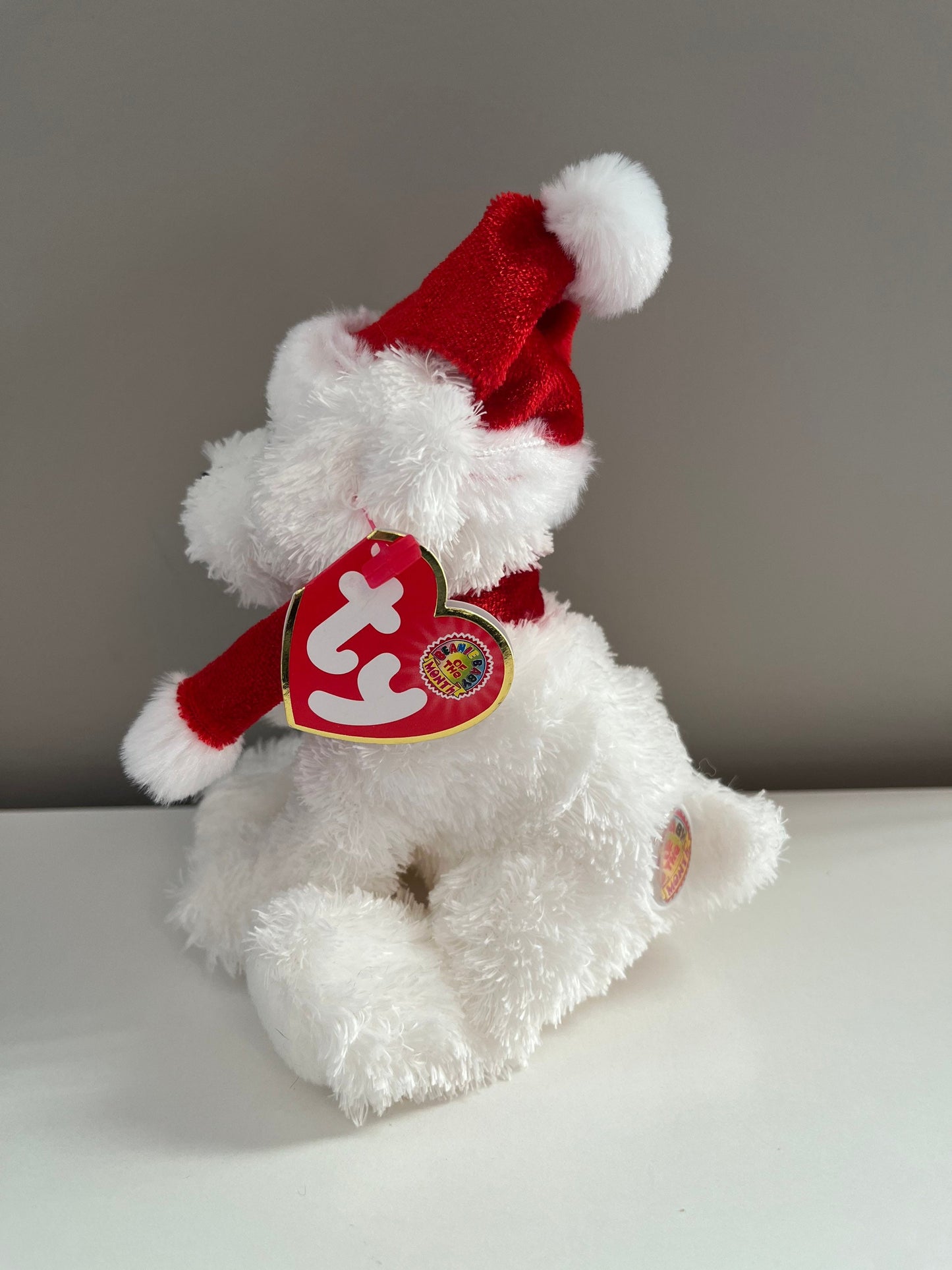 Ty Beanie Baby of the Month “Puppy Claus” the Cute White Dog Wearing Santa Hat *Rare* (5.5 inch)