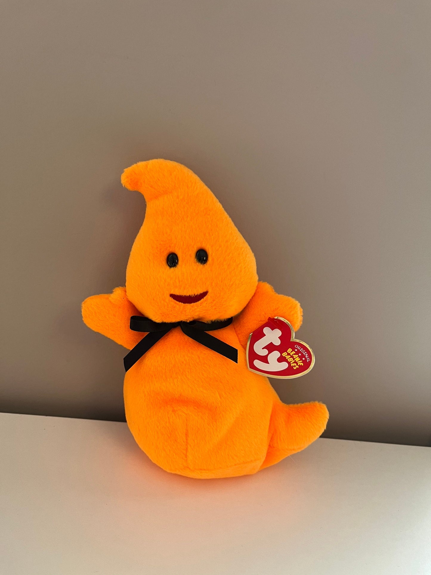 Ty Beanie Baby “Haunt” the Orange Ghost (6 inch)