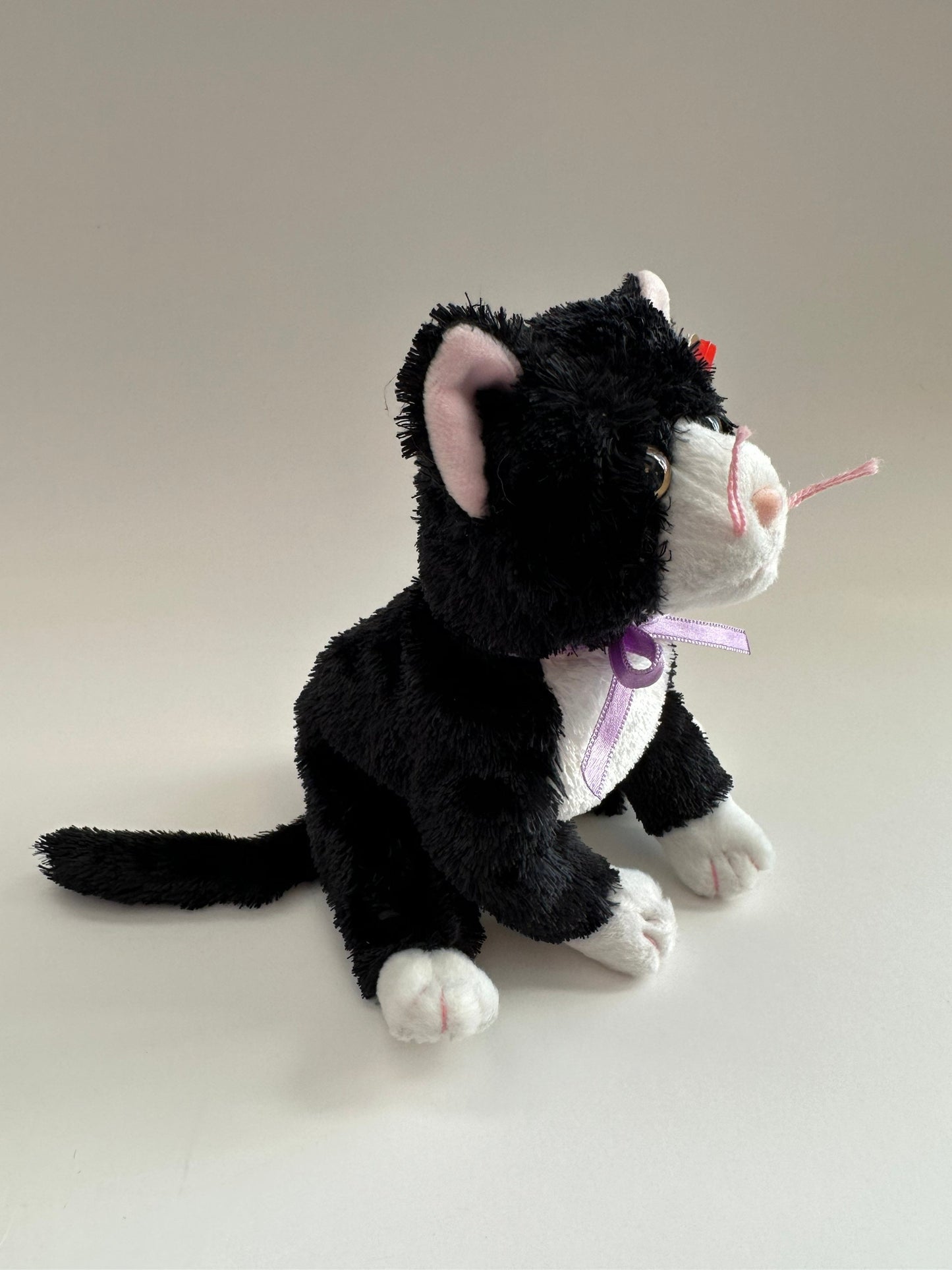 Ty Beanie Baby “Fussy” the Black and White Cat wearing a Purple Bow! (8 inch)