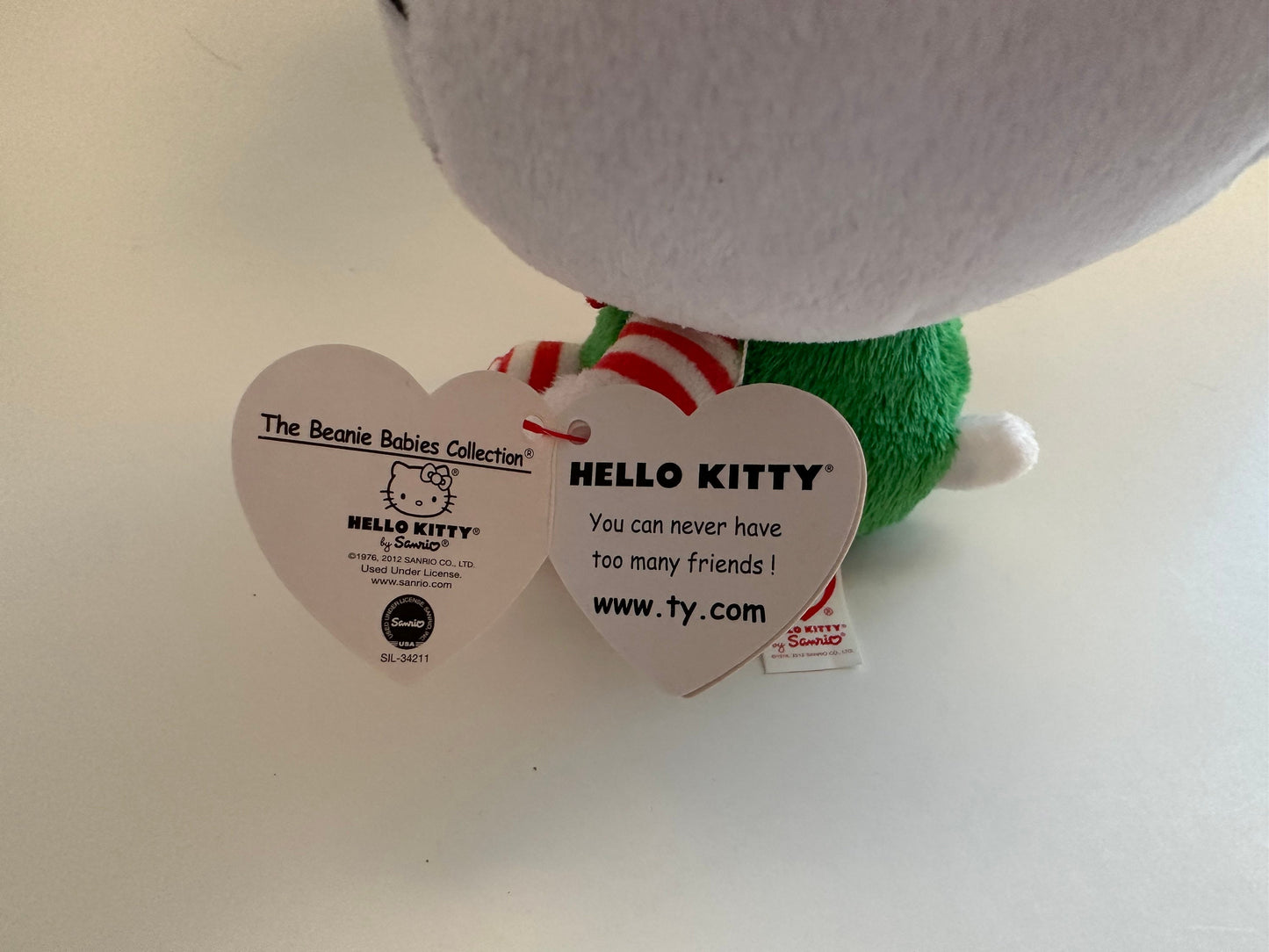 Ty Beanie Baby Vintage “Hello Kitty” the Hello Kitty Plush with Green Holiday Outfit and Santa Hat  (5.5 inch)