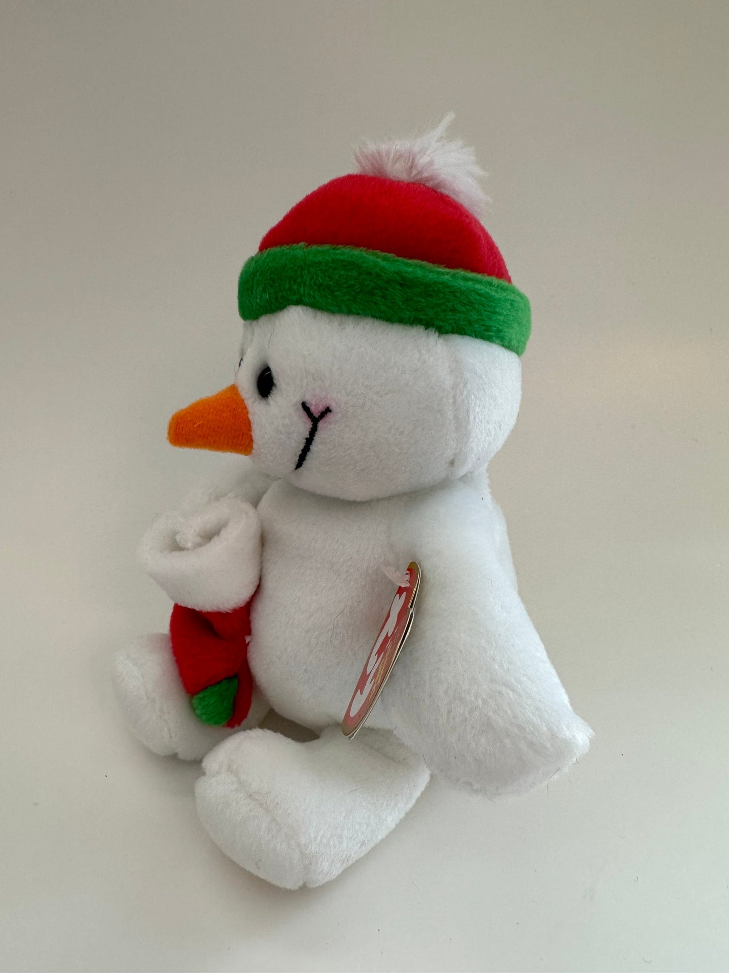 Ty Beanie Baby “Stockings” the Adorable Snowman holding Stocking (6 inch)