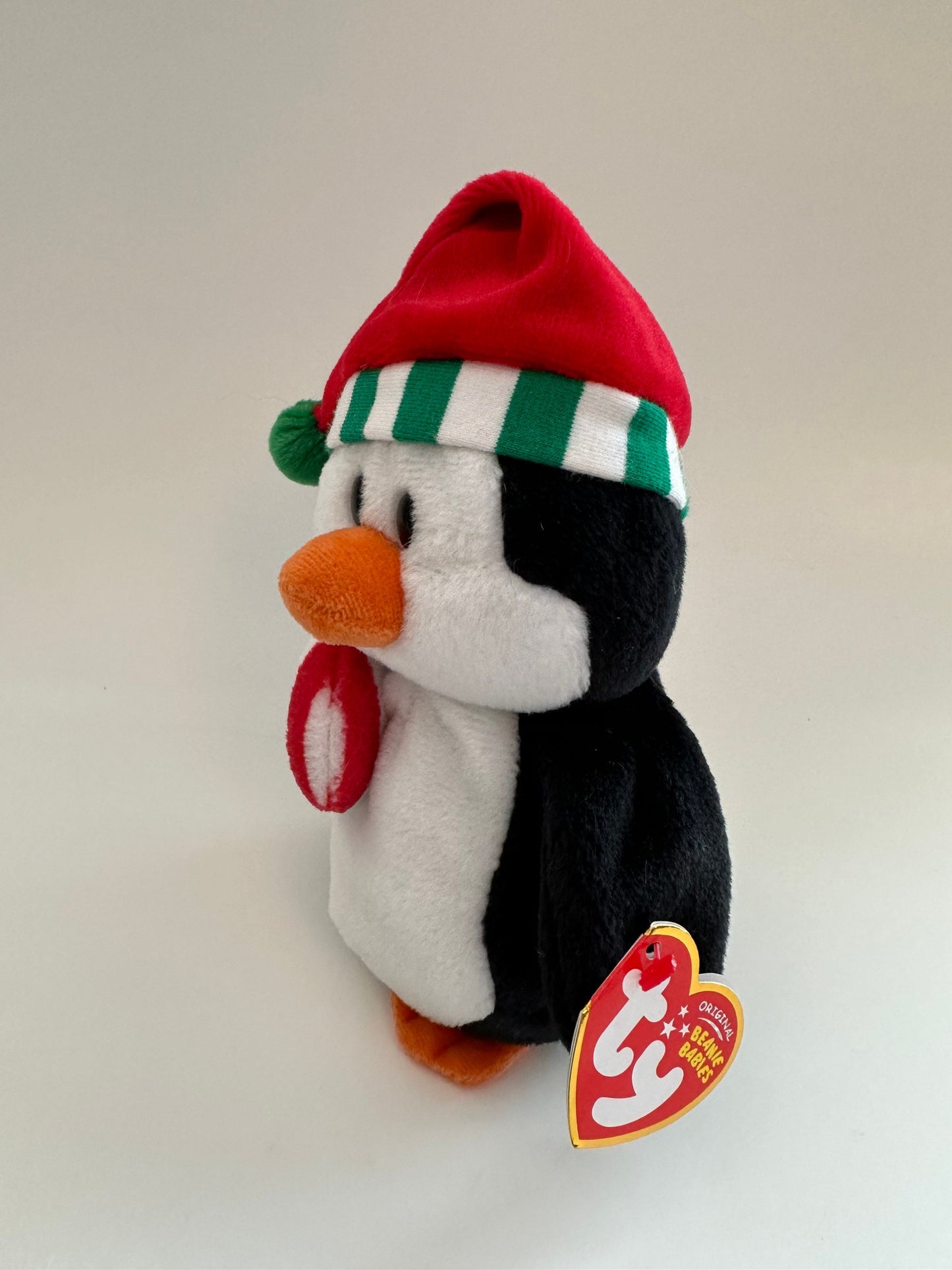 Ty Beanie Baby “Sweetest” the Holiday Penguin wearing Santa Hat holding Candy Cane (7 inch)