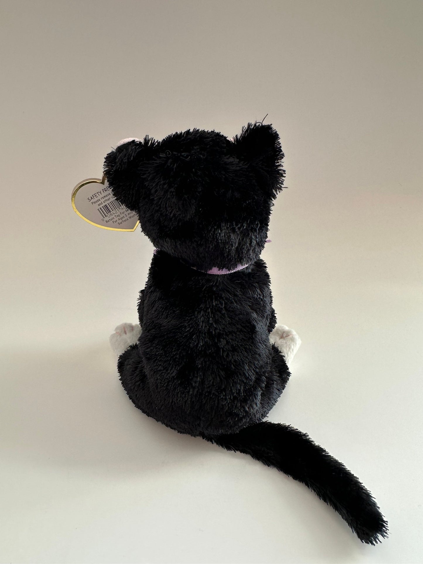 Ty Beanie Baby “Fussy” the Black and White Cat wearing a Purple Bow! (8 inch)