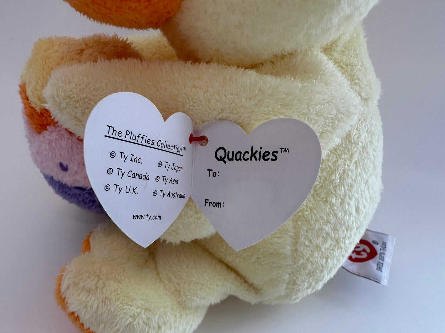 Ty Pluffies Collection “Quackies” the Adorable Duck holding Easter egg! (9 inch)