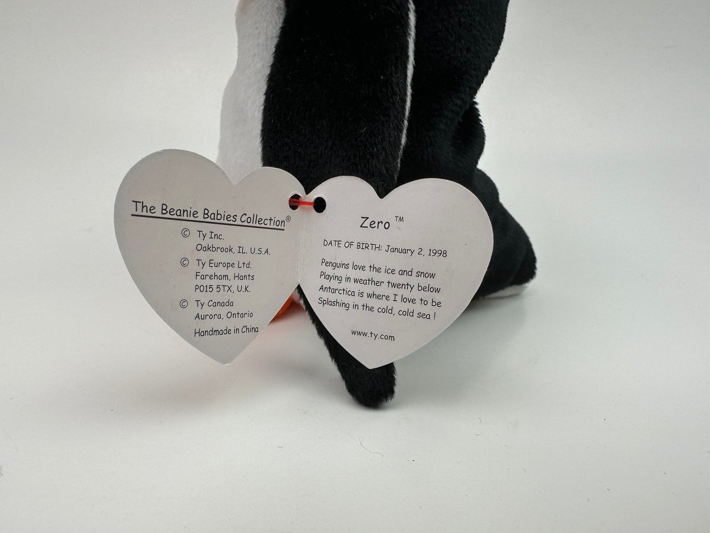 Ty Beanie Baby “Zero” the Christmas Penguin wearing a Santa Hat! (6 inch)