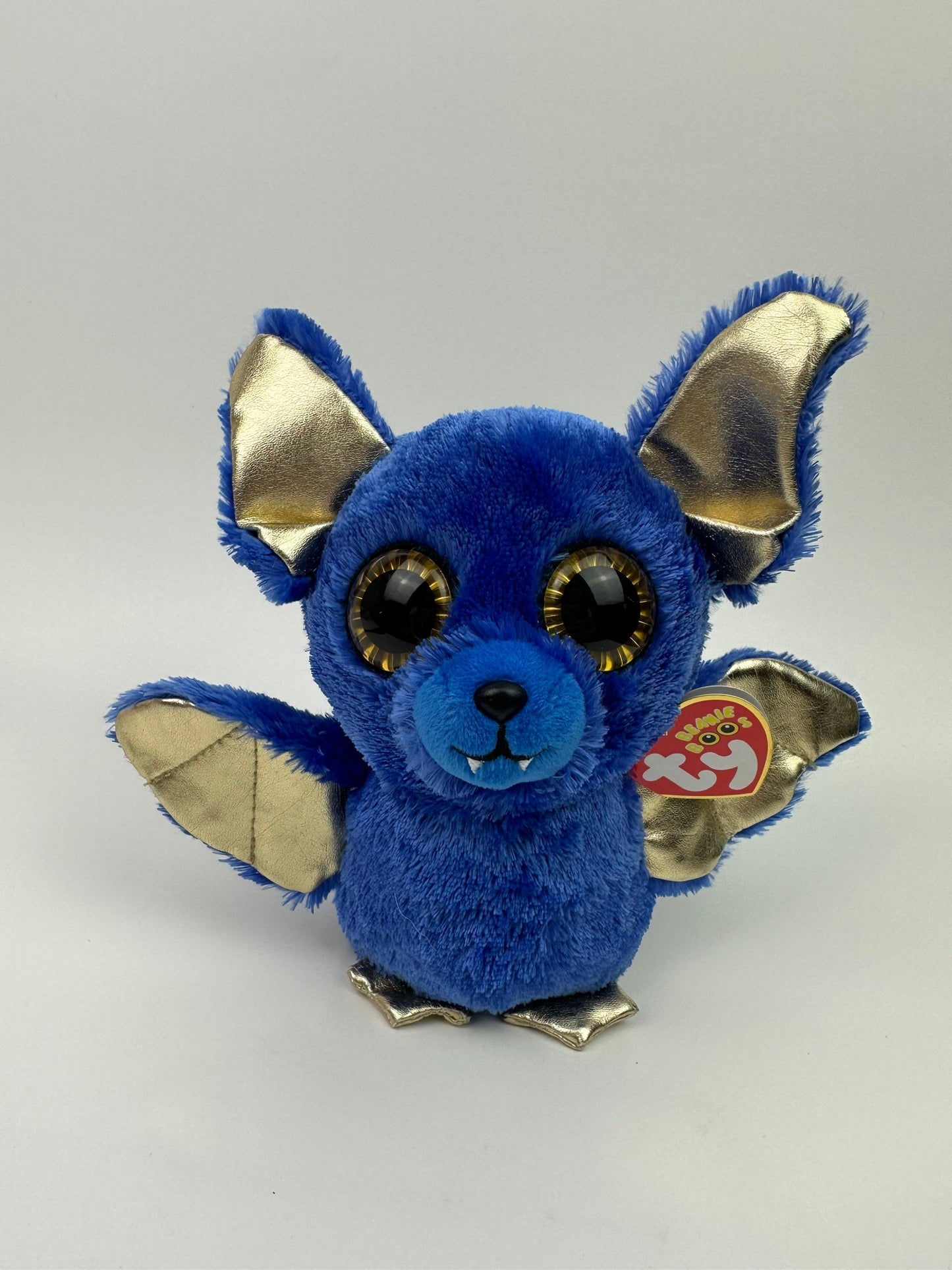 Ty Beanie Boo “Ozzy” the Blue Bat with Gold Wings, Eyes, and Ears (6 inch)