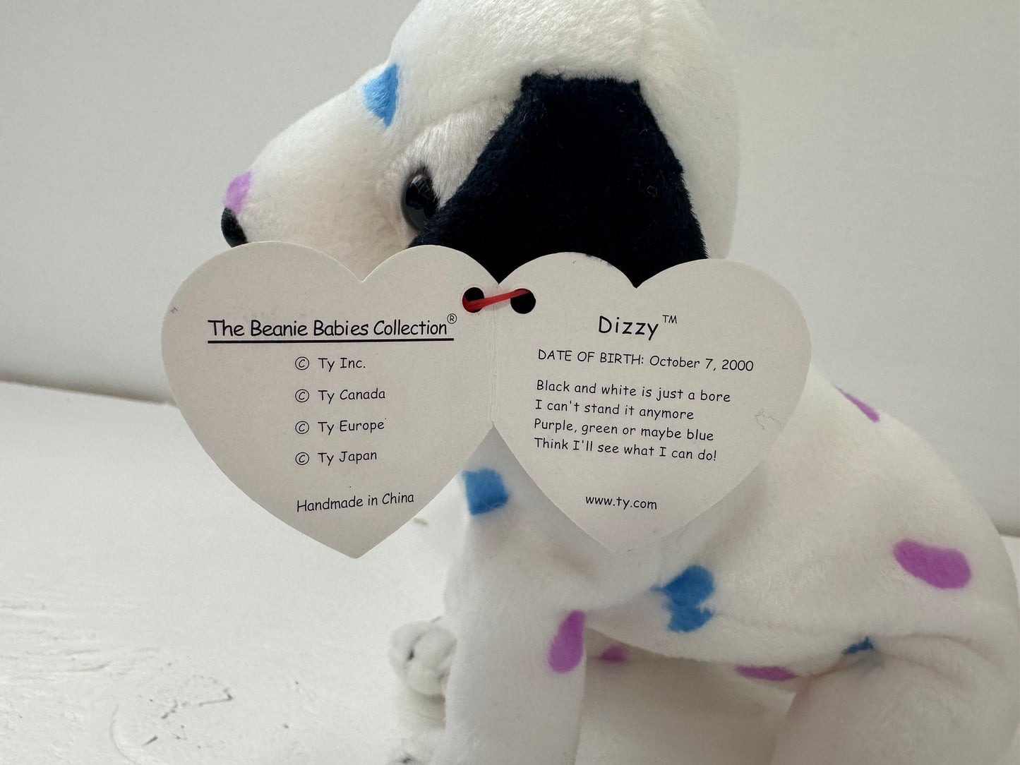 Ty Beanie Baby “Dizzy” the Dalmatian with purple and blue spots - black ears version (5.5 inch)