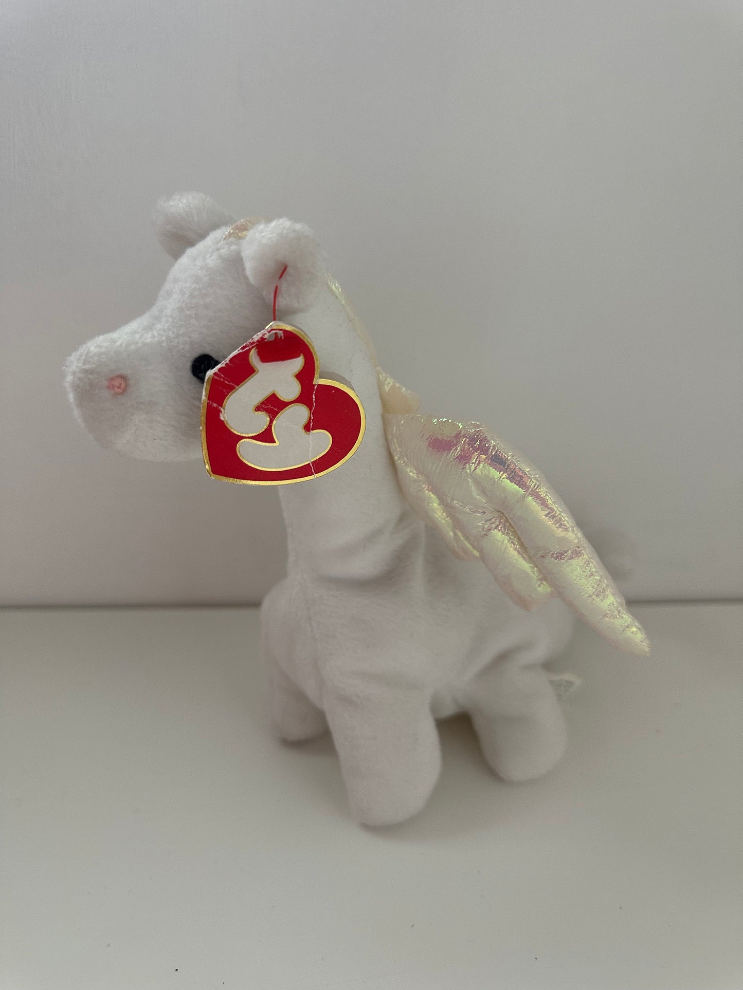 Ty Beanie Baby “Magic” the White Dragon - 3rd Generation Hang Tag, 1st Gen Canadian Tush Tag - Non Mint Tag *Rare*