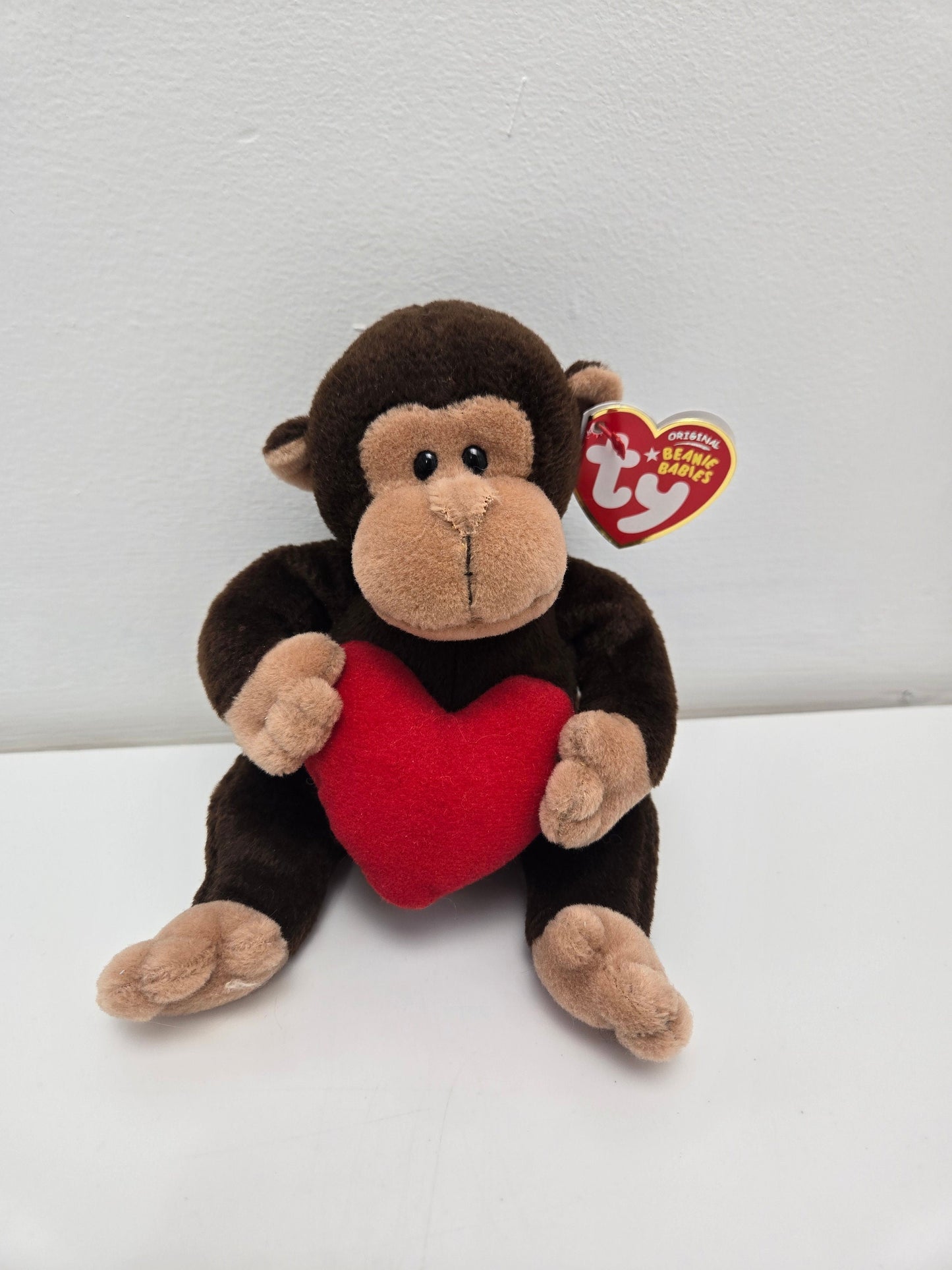 Ty Beanie Baby D’vine the Love Monkey holding a red heart (7.5 inch)