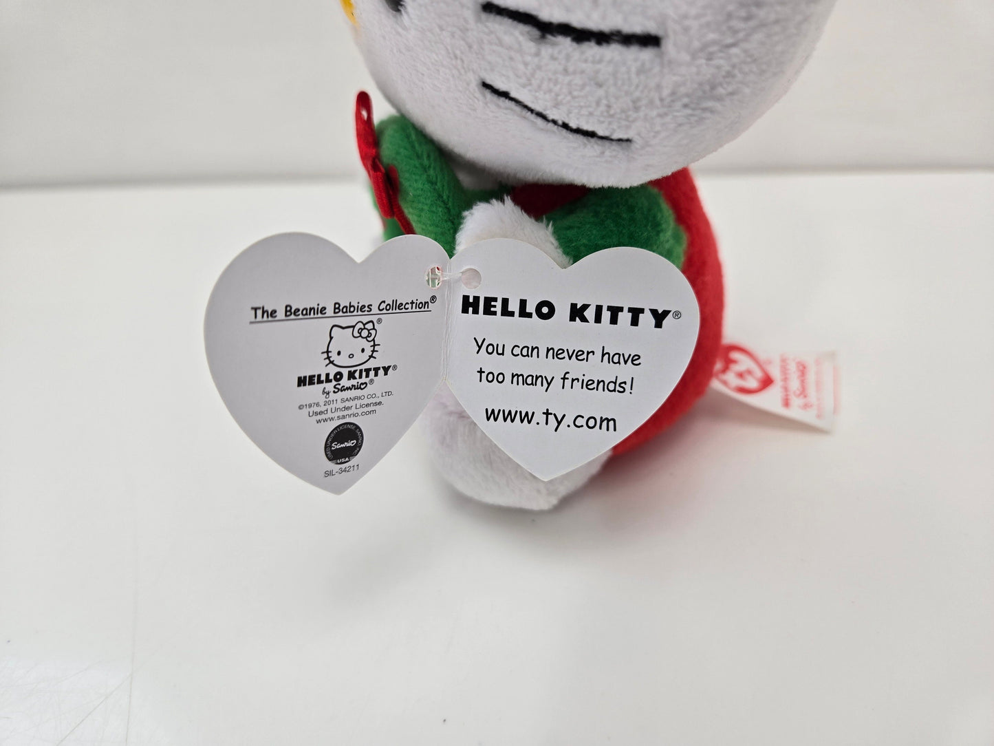 Ty Beanie Baby Vintage “Hello Kitty” the Holiday Hello Kitty Plush Wearing Santa Hat Holding Wreath  (5.5 inch)