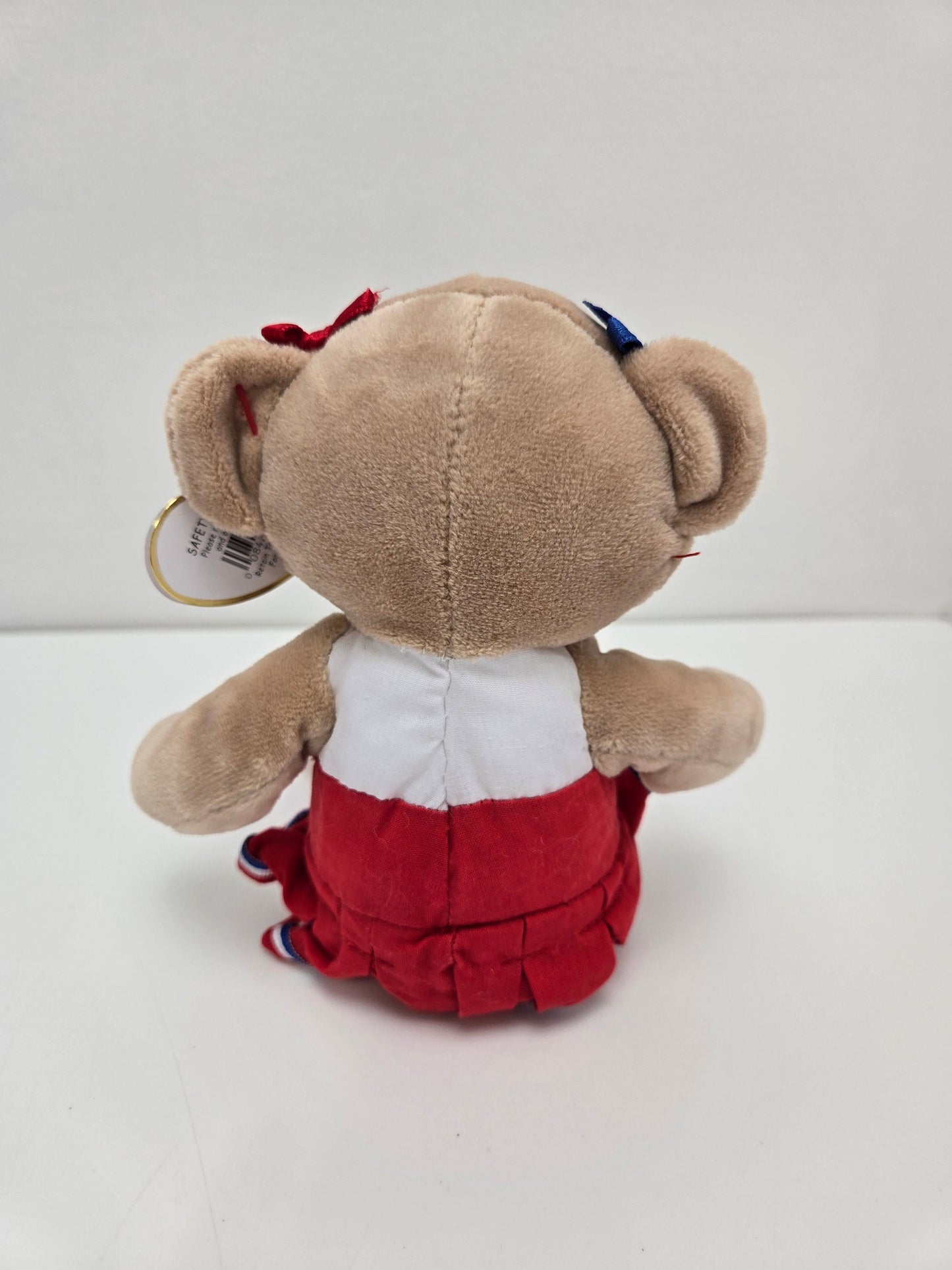 Ty Beanie Baby “Pompoms” the Cheerleader Bear wearing a cheer outfit  (8.5 inch)