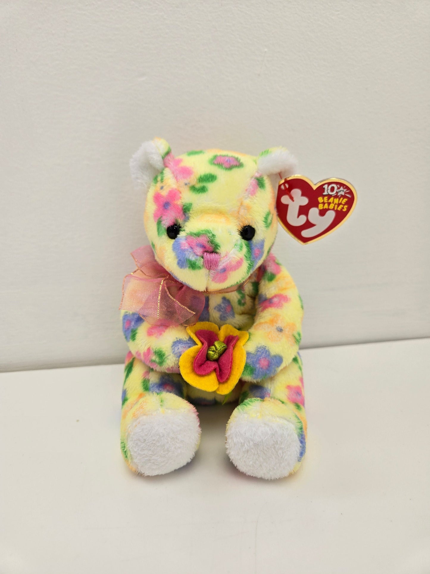 Ty Beanie Baby “Bloom” the Bear holding flowers (6 inch)