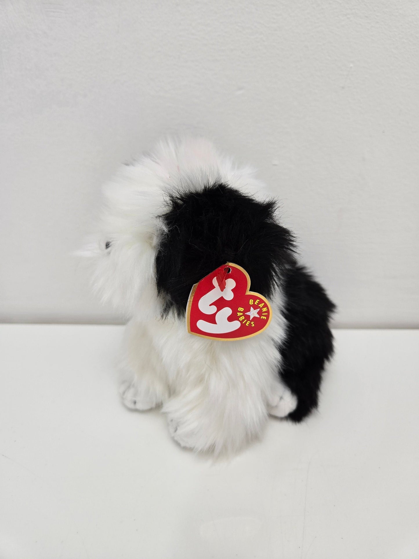 Ty Beanie Baby “Poofie” the Black and White Sheep Dog  (8 inch)