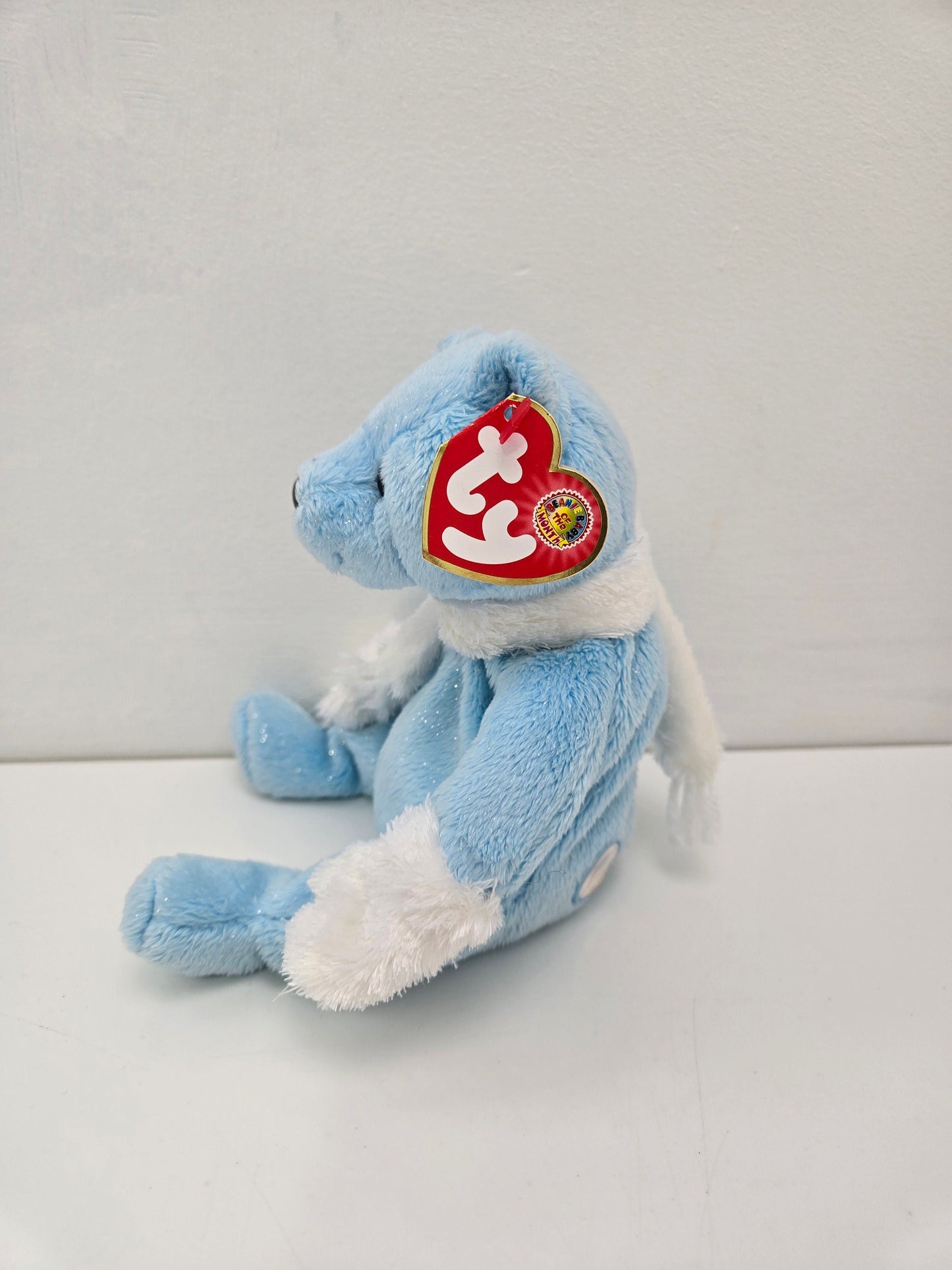 Ty Beanie Baby “Icecubes” the Blue Winter Bear wearing mittens and a scarf (7.5 inch)