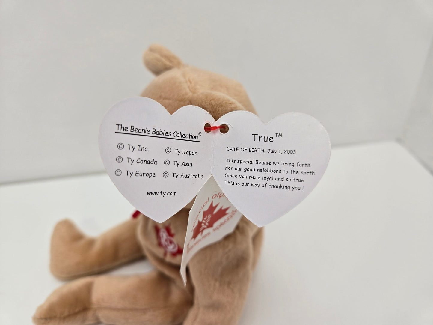 Ty Beanie Baby “True” the Canadian Bear with Maple Leaf on Chest - Special Olympics Tag (8.5 inch)