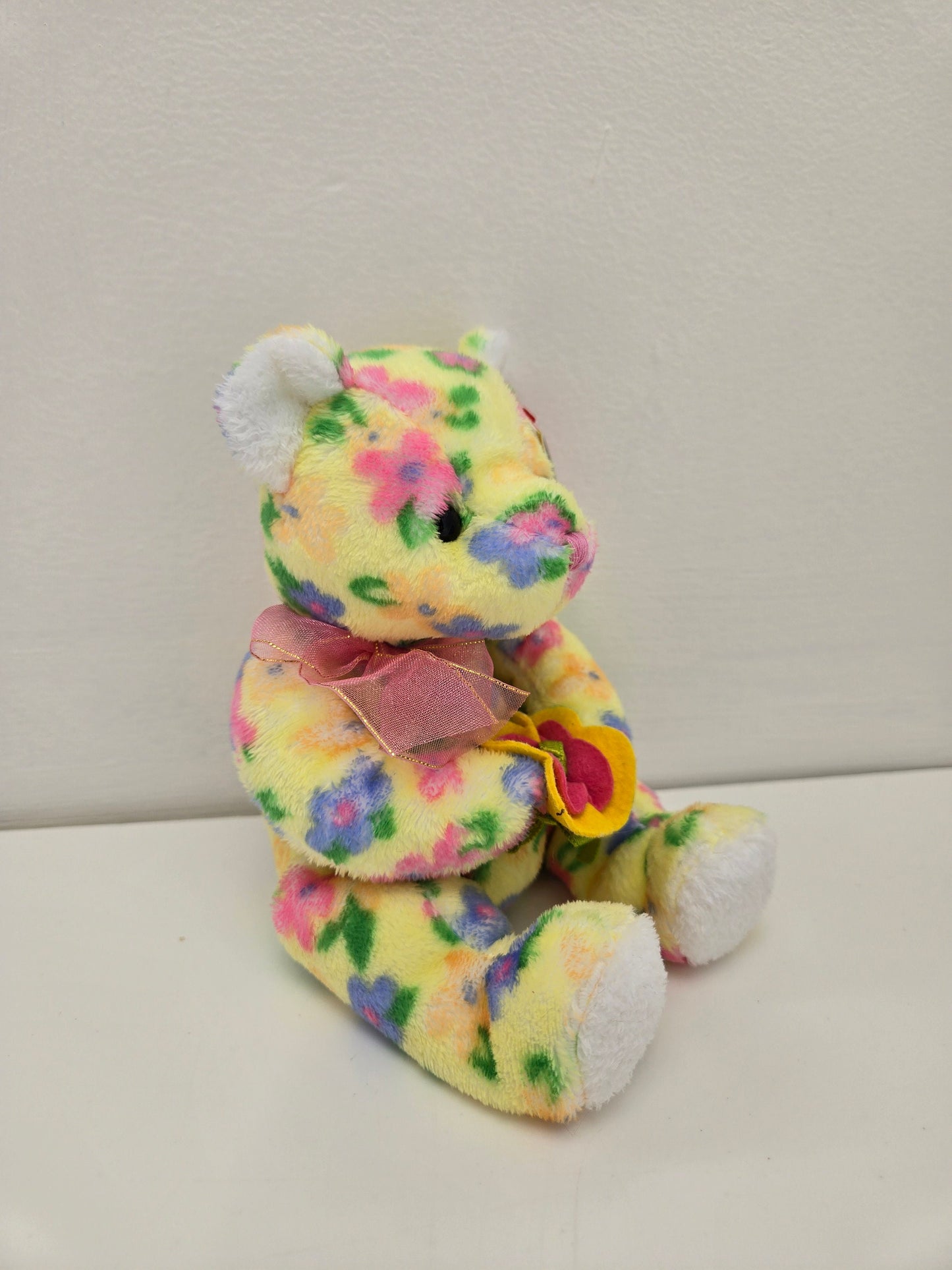 Ty Beanie Baby “Bloom” the Bear holding flowers (6 inch)