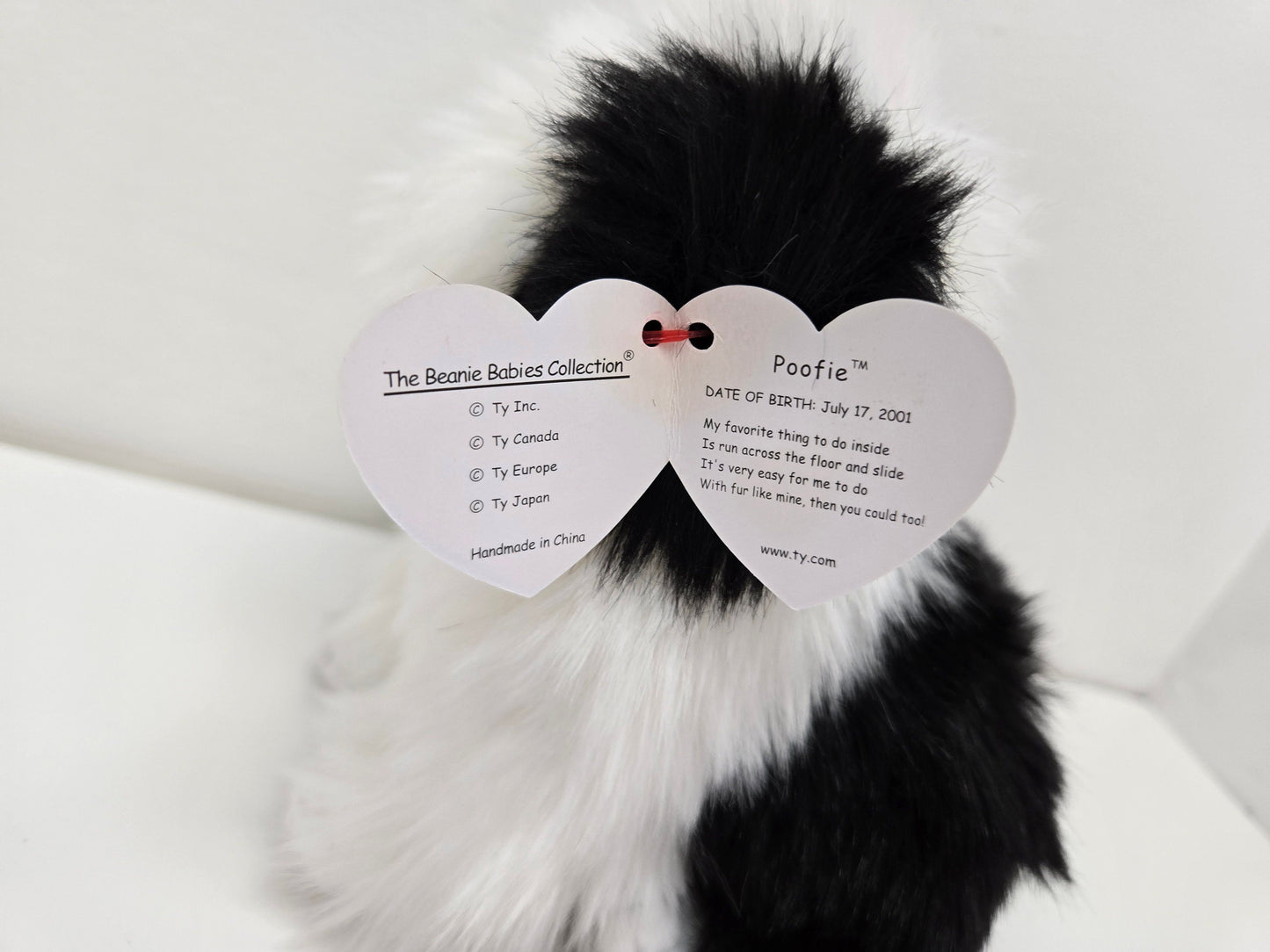 Ty Beanie Baby “Poofie” the Black and White Sheep Dog  (8 inch)