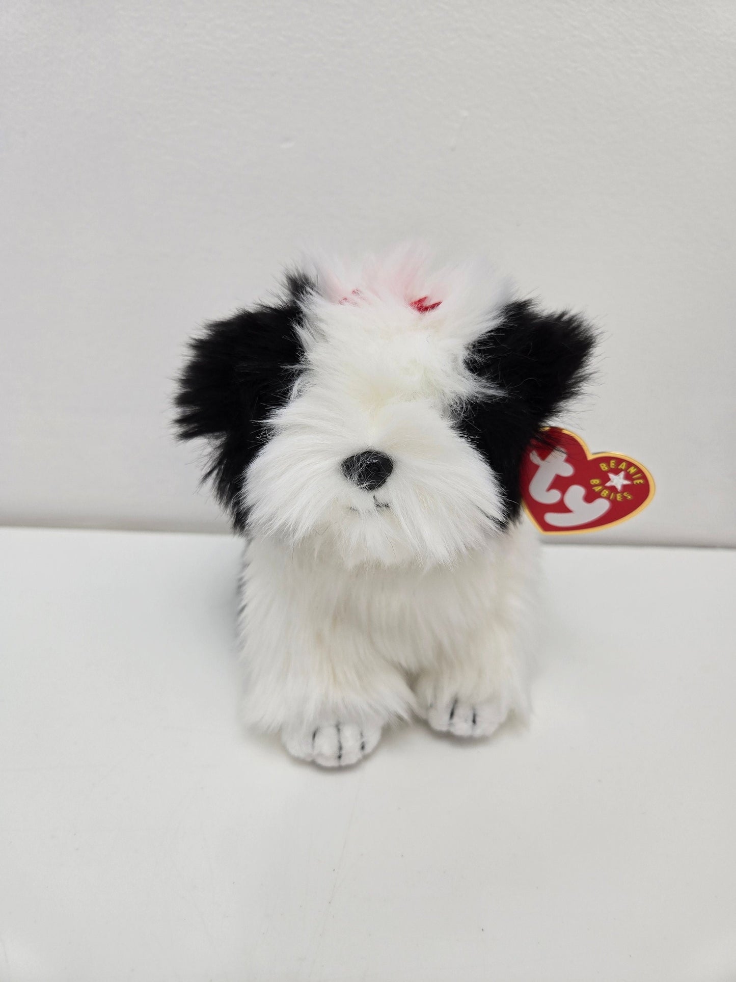 Ty Beanie Baby “Poofie” the Black and White Sheep Dog  (8 inch)