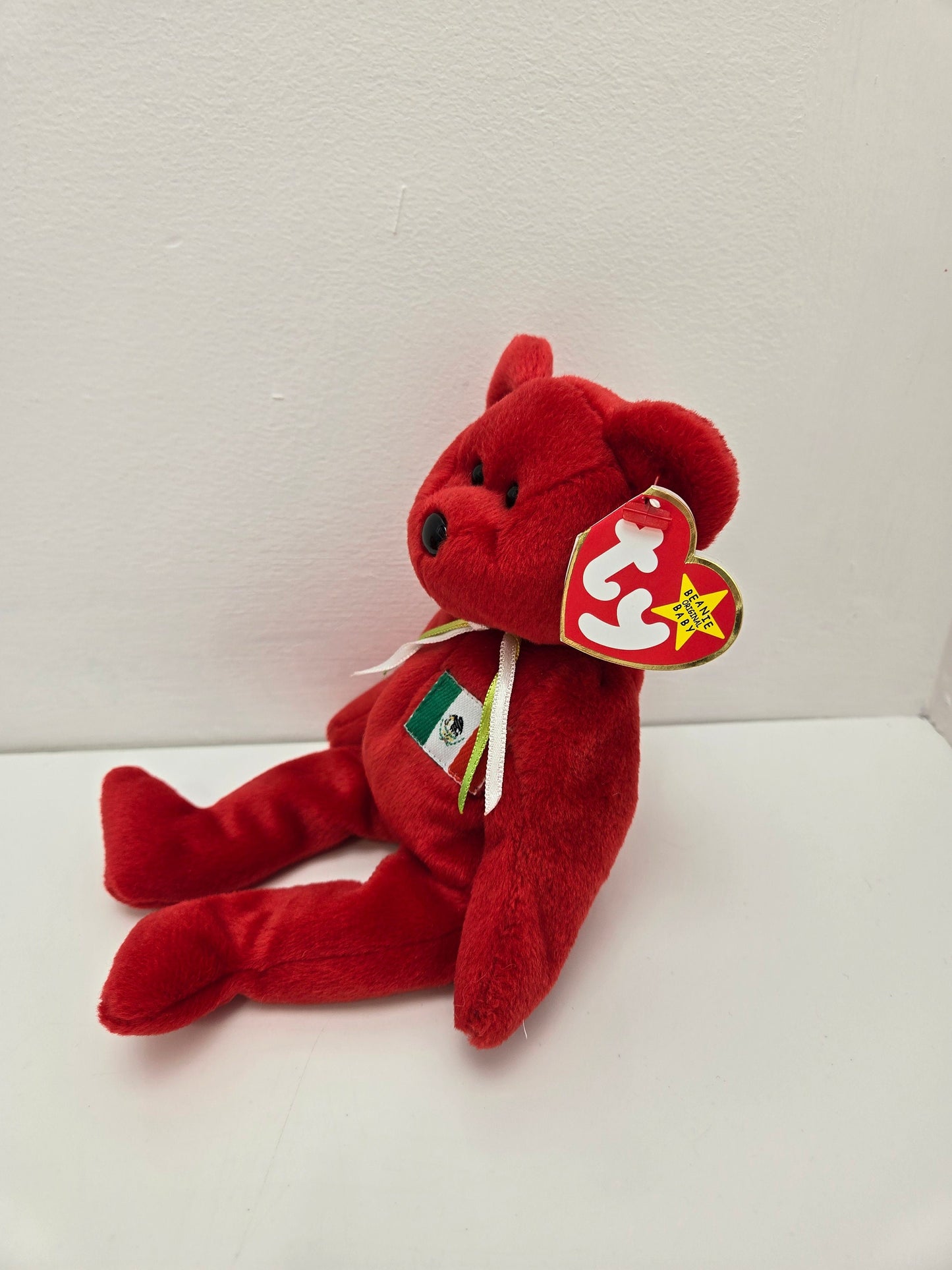 Ty Beanie Baby “Osito” the Red Mexico Bear wearing the Mexican flag proudly! (8.5 inch)