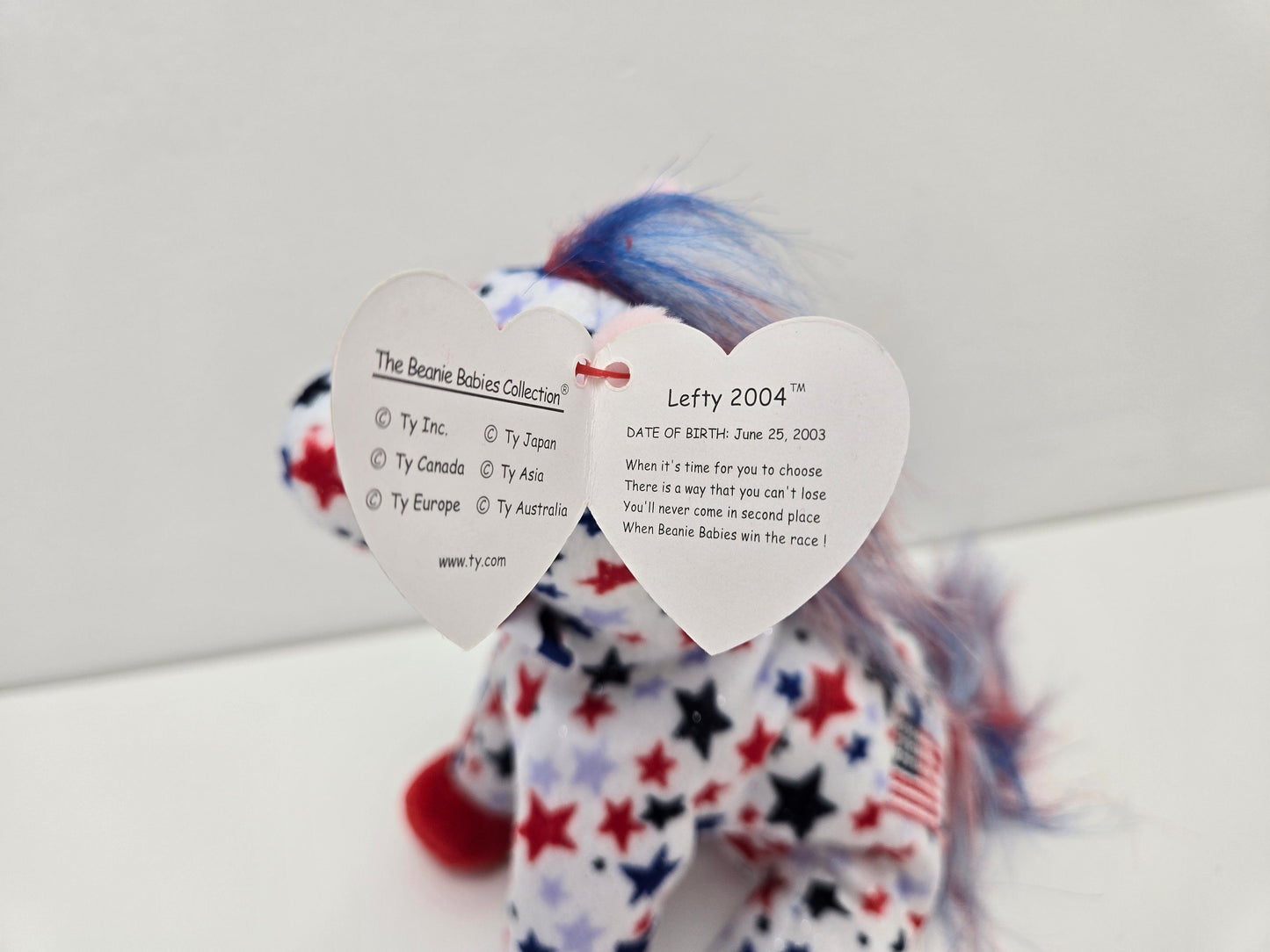 Ty Beanie Baby “Lefty 2004” the Patriotic Donkey with Red, White, and Blue Stars  (6 inch)