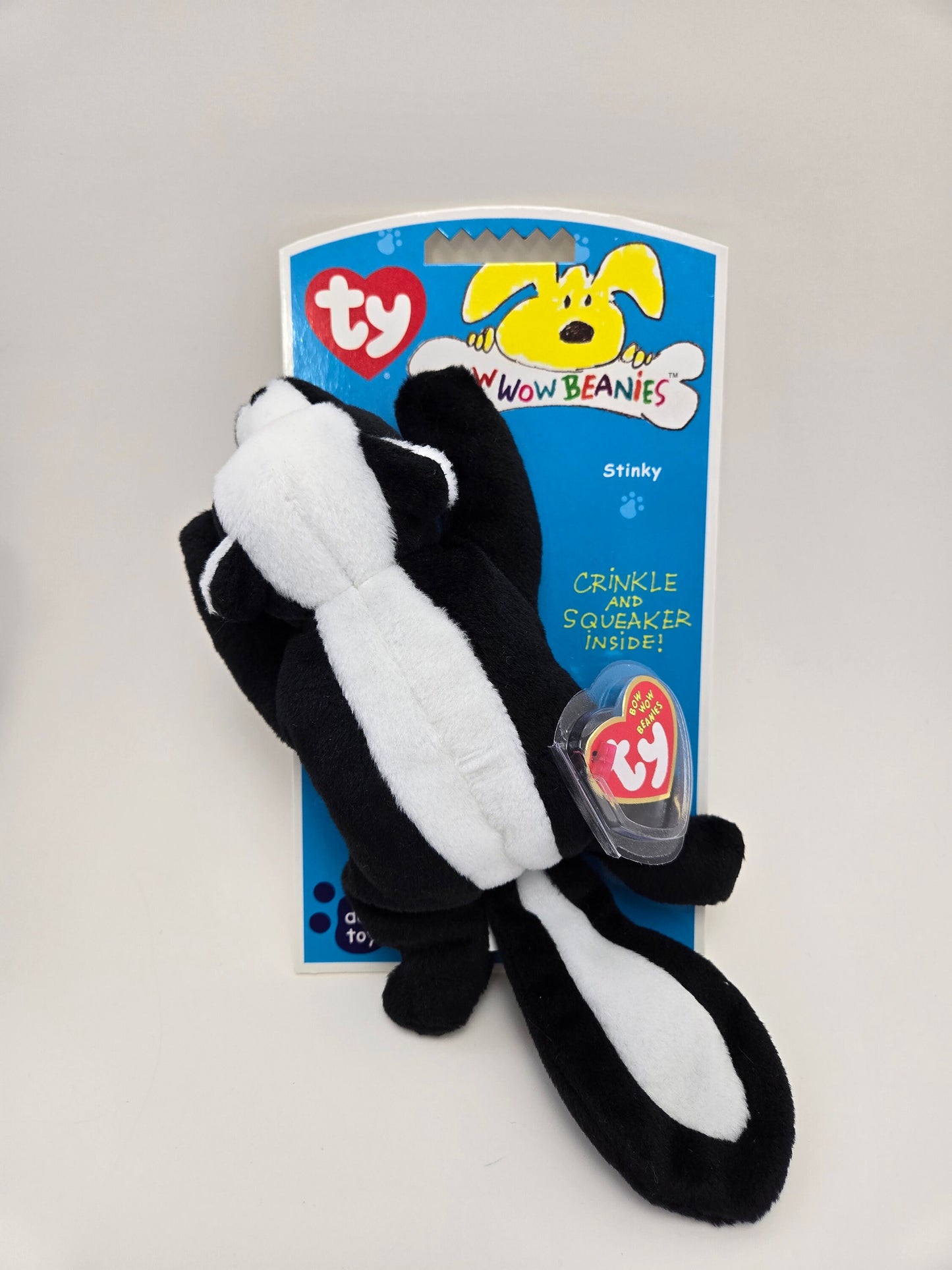 Ty Bow Wow Beanie Stinky the Skunk - Designed as a Dog Toy, Turned into a Collectors Item! (5 inch)